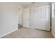 Bedroom with tile floor, closet and door to another room at 1593 76Th N Ave, St Petersburg, FL 33702