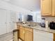 Well-equipped kitchen featuring modern appliances and ample cabinetry at 17996 Villa Creek Dr # 17996, Tampa, FL 33647