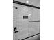 Clean bathroom with white subway tile and a bathtub at 2292 Austrian Ln # 34, Clearwater, FL 33763