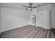 Bedroom with ceiling fan and access to bathroom at 2292 Austrian Ln # 34, Clearwater, FL 33763