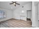 Bright bedroom with gray vinyl flooring and built-in cabinetry at 2292 Austrian Ln # 34, Clearwater, FL 33763