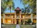 Inviting condo building with palm trees and a well-maintained entrance at 2292 Austrian Ln # 34, Clearwater, FL 33763