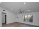 Spacious living room with vinyl flooring and vaulted ceilings at 2292 Austrian Ln # 34, Clearwater, FL 33763
