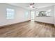 Spacious living room featuring wood-look floors and a ceiling fan at 2918 24Th N St, St Petersburg, FL 33713