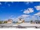 Aerial view of waterfront home with neighboring houses and blue skies at 364 144Th Ave, Madeira Beach, FL 33708