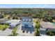 Elevated view of a charming two-story home with a spacious driveway at 4148 Rudder Way, New Port Richey, FL 34652