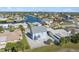 Aerial view showcasing a charming house near the water, in a quiet neighborhood at 4148 Rudder Way, New Port Richey, FL 34652
