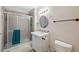 Clean bathroom with shower, sink, and toilet at 4148 Rudder Way, New Port Richey, FL 34652