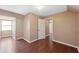 Well-lit bedroom, featuring wood flooring and window seat at 4148 Rudder Way, New Port Richey, FL 34652