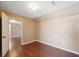 Spacious bedroom with wood flooring and an adjacent bathroom at 4148 Rudder Way, New Port Richey, FL 34652