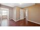 Well-lit bedroom, featuring wood flooring and window seat at 4148 Rudder Way, New Port Richey, FL 34652