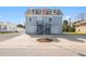Two-story house with double garage and a spacious driveway at 4148 Rudder Way, New Port Richey, FL 34652