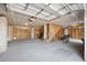 Unfinished garage with staircase and bicycle at 4148 Rudder Way, New Port Richey, FL 34652