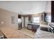 Kitchen with stainless steel appliances and dark wood cabinets at 4148 Rudder Way, New Port Richey, FL 34652