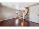 Living room with hardwood floors and access to kitchen at 4148 Rudder Way, New Port Richey, FL 34652