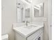 Bright bathroom with white vanity, quartz countertop, and updated fixtures at 503 Avocado Cir, Brandon, FL 33510