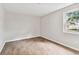 Spacious bedroom with neutral walls and wood-look tile floors at 503 Avocado Cir, Brandon, FL 33510