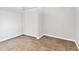 Cozy bedroom with wood-look tile floors and a closet at 503 Avocado Cir, Brandon, FL 33510