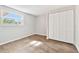 Bright bedroom with wood-look tile flooring and spacious closet at 503 Avocado Cir, Brandon, FL 33510