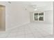 Living room with tile floors and large windows at 503 Avocado Cir, Brandon, FL 33510