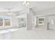 Open concept living room with a modern kitchen and tile flooring at 503 Avocado Cir, Brandon, FL 33510