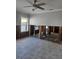Unfinished interior room with exposed framing and tile floor at 610 78Th Ave, St Pete Beach, FL 33706