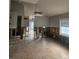 Unfinished interior with exposed framing and tile floor at 610 78Th Ave, St Pete Beach, FL 33706