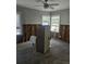 Unfinished interior room with toilet and exposed framing at 610 78Th Ave, St Pete Beach, FL 33706