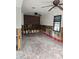 Kitchen under renovation, with tiled floor and brick wall at 610 78Th Ave, St Pete Beach, FL 33706