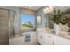 Spa-like bathroom with soaking tub, double vanity, and walk-in shower at 721 Sky Shade Dr, Apollo Beach, FL 33572