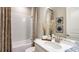 Clean bathroom with bathtub, shower, and modern vanity at 721 Sky Shade Dr, Apollo Beach, FL 33572