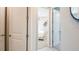Bright hallway with doors leading to bedrooms at 721 Sky Shade Dr, Apollo Beach, FL 33572