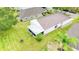 Overhead view of home and large lot, with a screened in back porch at 10543 Opus Dr, Riverview, FL 33579