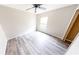 Bright bedroom with clean finishes and window letting in natural light at 10543 Opus Dr, Riverview, FL 33579