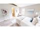 Stylishly decorated bedroom with bright natural light and soothing decor at 10543 Opus Dr, Riverview, FL 33579