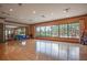 Large exercise room with hardwood floors and natural light at 11661 Callisia Dr, Odessa, FL 33556