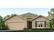 One-story home with neutral exterior, two-car garage, and landscaping at 1256 Maritime Hammock Ave, Ruskin, FL 33570