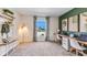Home office with two workspaces and plenty of natural light at 1256 Maritime Hammock Ave, Ruskin, FL 33570
