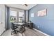 Bright office with gray walls, wood floors, and natural light at 16026 10Th E Ave, Bradenton, FL 34212