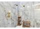 Shower with marble tile and dual shower heads at 1903 Gulf Beach Blvd, Tarpon Springs, FL 34689