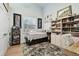 Bright bedroom with built-in shelving and a cozy atmosphere at 1903 Gulf Beach Blvd, Tarpon Springs, FL 34689