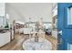 Bright living room with hardwood floors and open floor plan at 1903 Gulf Beach Blvd, Tarpon Springs, FL 34689