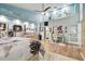 Spacious main bedroom with ample closet space and a sitting area at 1903 Gulf Beach Blvd, Tarpon Springs, FL 34689