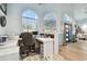 Home office with built-in desk and plenty of natural light at 1903 Gulf Beach Blvd, Tarpon Springs, FL 34689