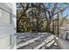 Relaxing screened porch with comfortable seating and natural light at 1903 Gulf Beach Blvd, Tarpon Springs, FL 34689