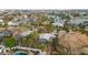 High-angle view of house and neighborhood near the water at 3863 Belle Vista E Dr, St Pete Beach, FL 33706