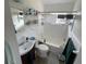 Clean bathroom with a tub, sink, and shower at 3863 Belle Vista E Dr, St Pete Beach, FL 33706