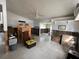 Living room under renovation with exposed walls and flooring at 3863 Belle Vista E Dr, St Pete Beach, FL 33706