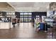 Modern coffee shop interior with ample seating, stylish lighting, and a sleek serving area at 3901 Tour Trce, Land O Lakes, FL 34638