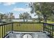 Enjoy breathtaking lake views from this peaceful deck at 423 E County Line Rd, Lutz, FL 33549